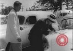Image of car dealer alerts FBI stolen automobile Maryland United States USA, 1956, second 32 stock footage video 65675078757