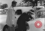 Image of car dealer alerts FBI stolen automobile Maryland United States USA, 1956, second 34 stock footage video 65675078757
