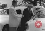 Image of car dealer alerts FBI stolen automobile Maryland United States USA, 1956, second 37 stock footage video 65675078757