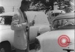 Image of car dealer alerts FBI stolen automobile Maryland United States USA, 1956, second 40 stock footage video 65675078757
