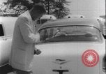 Image of car dealer alerts FBI stolen automobile Maryland United States USA, 1956, second 42 stock footage video 65675078757