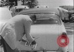 Image of car dealer alerts FBI stolen automobile Maryland United States USA, 1956, second 44 stock footage video 65675078757