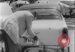 Image of car dealer alerts FBI stolen automobile Maryland United States USA, 1956, second 45 stock footage video 65675078757