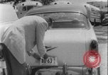 Image of car dealer alerts FBI stolen automobile Maryland United States USA, 1956, second 46 stock footage video 65675078757