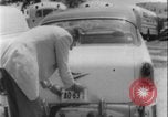 Image of car dealer alerts FBI stolen automobile Maryland United States USA, 1956, second 49 stock footage video 65675078757