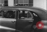 Image of car dealer alerts FBI stolen automobile Maryland United States USA, 1956, second 50 stock footage video 65675078757