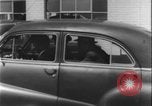 Image of car dealer alerts FBI stolen automobile Maryland United States USA, 1956, second 51 stock footage video 65675078757