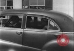 Image of car dealer alerts FBI stolen automobile Maryland United States USA, 1956, second 52 stock footage video 65675078757