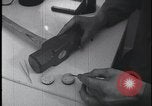 Image of FBI technicians view forensic evidence with microscopes United States USA, 1959, second 4 stock footage video 65675078761