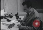 Image of FBI technicians view forensic evidence with microscopes United States USA, 1959, second 8 stock footage video 65675078761