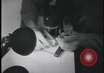 Image of FBI technicians view forensic evidence with microscopes United States USA, 1959, second 10 stock footage video 65675078761