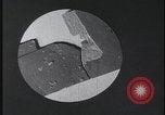 Image of FBI technicians view forensic evidence with microscopes United States USA, 1959, second 17 stock footage video 65675078761