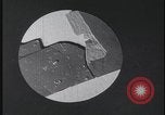 Image of FBI technicians view forensic evidence with microscopes United States USA, 1959, second 18 stock footage video 65675078761