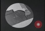 Image of FBI technicians view forensic evidence with microscopes United States USA, 1959, second 20 stock footage video 65675078761