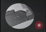 Image of FBI technicians view forensic evidence with microscopes United States USA, 1959, second 21 stock footage video 65675078761