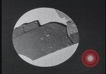 Image of FBI technicians view forensic evidence with microscopes United States USA, 1959, second 23 stock footage video 65675078761