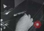 Image of FBI technicians view forensic evidence with microscopes United States USA, 1959, second 25 stock footage video 65675078761