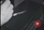 Image of FBI technicians view forensic evidence with microscopes United States USA, 1959, second 26 stock footage video 65675078761