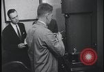 Image of FBI technicians view forensic evidence with microscopes United States USA, 1959, second 29 stock footage video 65675078761