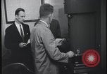 Image of FBI technicians view forensic evidence with microscopes United States USA, 1959, second 31 stock footage video 65675078761