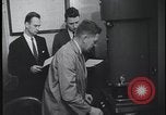 Image of FBI technicians view forensic evidence with microscopes United States USA, 1959, second 34 stock footage video 65675078761