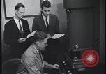 Image of FBI technicians view forensic evidence with microscopes United States USA, 1959, second 35 stock footage video 65675078761