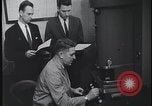 Image of FBI technicians view forensic evidence with microscopes United States USA, 1959, second 36 stock footage video 65675078761