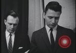 Image of FBI technicians view forensic evidence with microscopes United States USA, 1959, second 37 stock footage video 65675078761