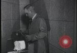 Image of FBI technicians view forensic evidence with microscopes United States USA, 1959, second 62 stock footage video 65675078761