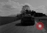 Image of M4 tanks on road Germany, 1945, second 7 stock footage video 65675078812