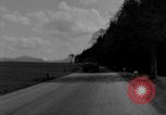 Image of M4 tanks on road Germany, 1945, second 18 stock footage video 65675078812
