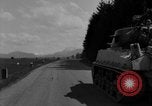 Image of M4 tanks on road Germany, 1945, second 30 stock footage video 65675078812