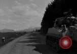 Image of M4 tanks on road Germany, 1945, second 33 stock footage video 65675078812