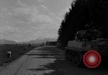 Image of M4 tanks on road Germany, 1945, second 37 stock footage video 65675078812