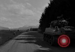 Image of M4 tanks on road Germany, 1945, second 38 stock footage video 65675078812