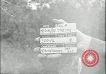 Image of 105mm HE smoke shell leaflet replacement Fort Riley Kansas USA, 1951, second 1 stock footage video 65675078828