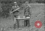 Image of 105mm HE smoke shell leaflet replacement Fort Riley Kansas USA, 1951, second 6 stock footage video 65675078828