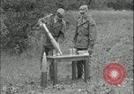 Image of 105mm HE smoke shell leaflet replacement Fort Riley Kansas USA, 1951, second 8 stock footage video 65675078828