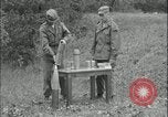 Image of 105mm HE smoke shell leaflet replacement Fort Riley Kansas USA, 1951, second 12 stock footage video 65675078828