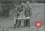 Image of 105mm HE smoke shell leaflet replacement Fort Riley Kansas USA, 1951, second 16 stock footage video 65675078828