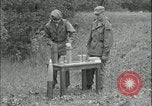 Image of 105mm HE smoke shell leaflet replacement Fort Riley Kansas USA, 1951, second 20 stock footage video 65675078828