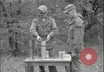 Image of 105mm HE smoke shell leaflet replacement Fort Riley Kansas USA, 1951, second 33 stock footage video 65675078828
