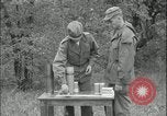 Image of 105mm HE smoke shell leaflet replacement Fort Riley Kansas USA, 1951, second 36 stock footage video 65675078828