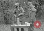 Image of 105mm HE smoke shell leaflet replacement Fort Riley Kansas USA, 1951, second 37 stock footage video 65675078828