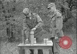 Image of 105mm HE smoke shell leaflet replacement Fort Riley Kansas USA, 1951, second 38 stock footage video 65675078828