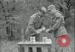 Image of 105mm HE smoke shell leaflet replacement Fort Riley Kansas USA, 1951, second 42 stock footage video 65675078828
