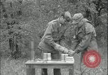 Image of 105mm HE smoke shell leaflet replacement Fort Riley Kansas USA, 1951, second 43 stock footage video 65675078828