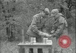 Image of 105mm HE smoke shell leaflet replacement Fort Riley Kansas USA, 1951, second 45 stock footage video 65675078828