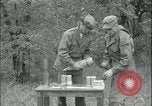 Image of 105mm HE smoke shell leaflet replacement Fort Riley Kansas USA, 1951, second 46 stock footage video 65675078828
