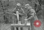 Image of 105mm HE smoke shell leaflet replacement Fort Riley Kansas USA, 1951, second 47 stock footage video 65675078828